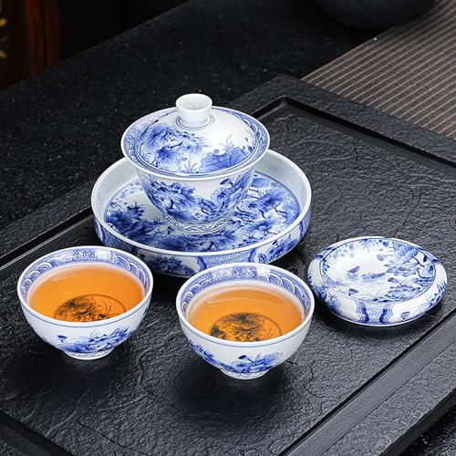 Juego de té de porcelana china con tetera, patrón floral azul y blanco, tradicional con tazas y platillo