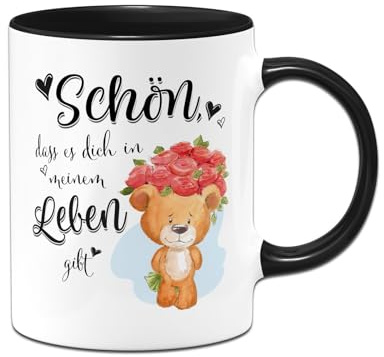 Tassenbrennerei Tasse - Schön, dass es Dich in meinem Leben gibt! - Ich Liebe Dich Geschenk für Frauen, Männer - Kaffeetasse mit Teddy und Spruch für Freund, Freundin zum Valentinstag (Schwarz)