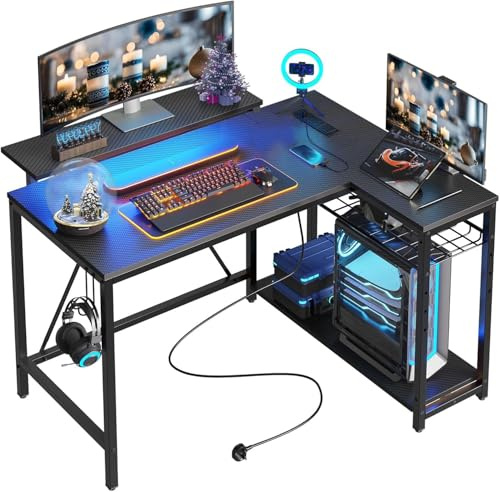 Bestier Gaming Desk with Power Outlets, 42 L-Shaped Computer Desk with LED Lights, Desk with Reversible Storage Shelves & Hooks for Small Spaces, Bedrooms & Offices, Black Carbon Fiber