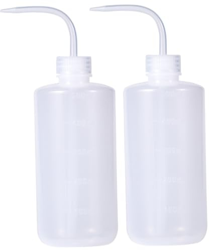 Takingup Botellas exprimibles, 2 dispensadores de plástico de 500 ml con boquillas de medición para líquidos, botellas exprimibles con boquillas
