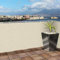 Bakaji Telo Copertura Frangivista Frangivento per Ringhiera Protezione Balcone Dimensione 600 x 90 cm in Tessuto PVC Aggancio ad Occhielli Corda 24mt Inclusa (Beige)