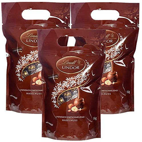 Lindt LINDOR Schokoladen Kugeln Haselnuss | 1 kg Beutel, wiederverschließbar | ca. 80 Schokoladen Kugeln Haselnuss-Milch-Schokolade | Großpackung, Pralinen-Geschenk, Schokoladengeschenk (3 x 1 kg)