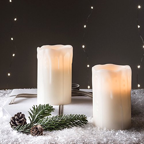 Lights4fun 4er Set LED Kerzen Echtwachs mit Zeitschaltuhr Batteriebetrieb