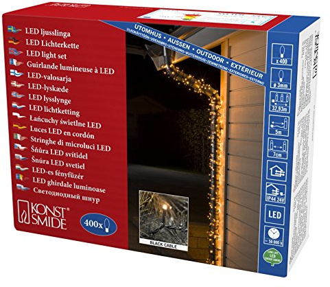 Konstsmide Micro LED Lichterkette, 400 bernsteinfarbene Dioden, 24V Außentrafo, schwarzes Kabel - 3644-800