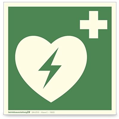 Betriebsausstattung24 Erste-Hilfe-Schild Automatisierter Externer Defibrillator (AED) - selbstklebende Folie, langnachleuchtend 15 x 15 cm - ASR A1.3 ISO 7010 E010 - DIN 67510 Klasse C