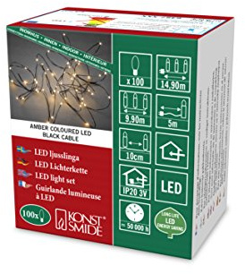 Konstsmide LED Tropfenlichterkette, 100 bernsteinfarbene Dioden, 3V Innentrafo, schwarzer Draht - 6387-800