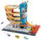 Matchbox Action Drivers Centro de transporte Parking de 5 plantas para coches de juguete, con muelle para barcos y helipuerto, incluye 3 vehículos, +3 años (HXL47)